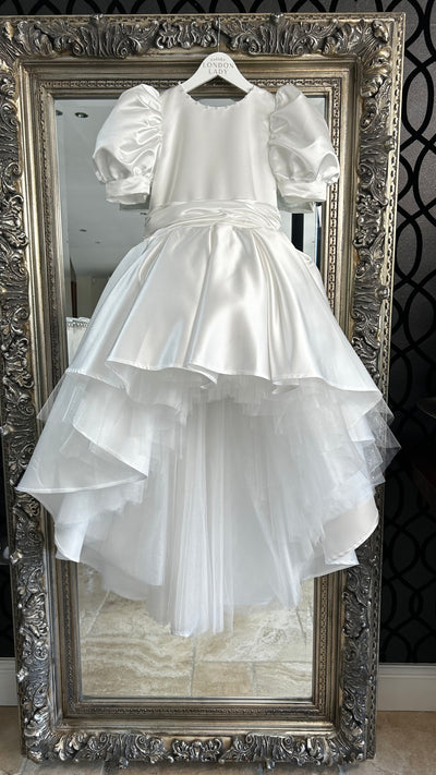 Flower girl dress in ivory satin with pearl back and sweetheart back. 